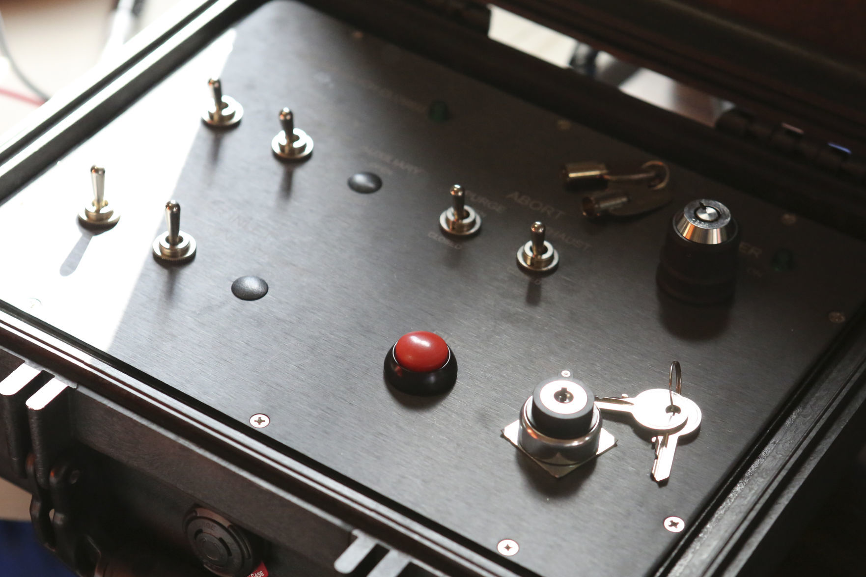 Red detonation button ignites gases in shock tube